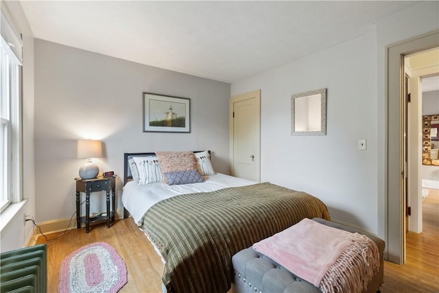 456 N Main St, Benton, NY 14527 - bedroom featuring wood finished floors and baseboards
