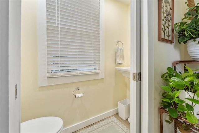 456 N Main St, Benton, NY 14527 - half bath featuring baseboards and toilet