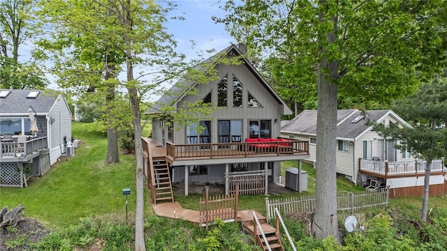 6525 Bonnie Castle Rd, Huron, NY 14590 - back of house with a wooden deck, board and batten siding, and stairway
