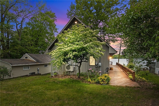 6525 Bonnie Castle Rd, Huron, NY 14590 - view of property exterior featuring a yard and board and batten siding