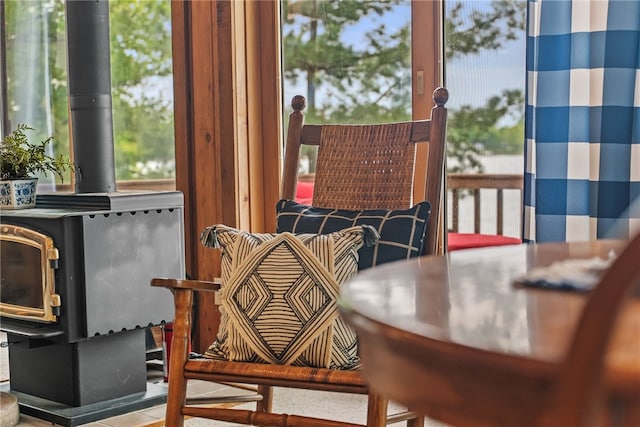 6525 Bonnie Castle Rd, Huron, NY 14590 - sunroom featuring a wood stove