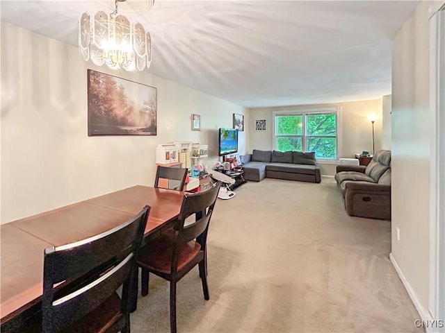 8304 Radian, Clay, NY 13027 - dining space with a chandelier and carpet
