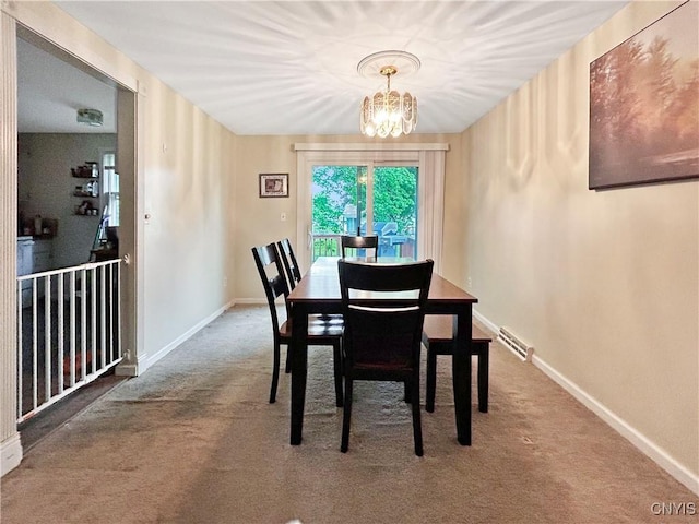 8304 Radian, Clay, NY 13027 - carpeted dining room with a chandelier and baseboards