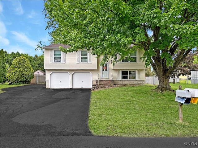 8304 Radian, Clay, NY 13027 - bi-level home with a garage and asphalt driveway