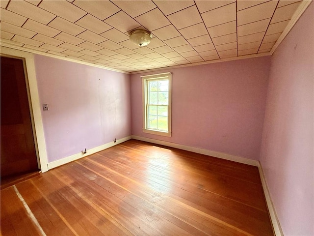 9 Weidman St, Unadilla, NY 13849 - spare room with hardwood / wood-style floors, baseboards, and ornamental molding