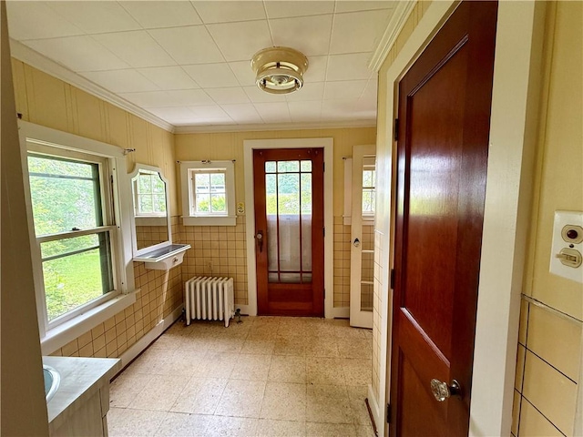 9 Weidman St, Unadilla, NY 13849 - doorway with radiator heating unit and crown molding