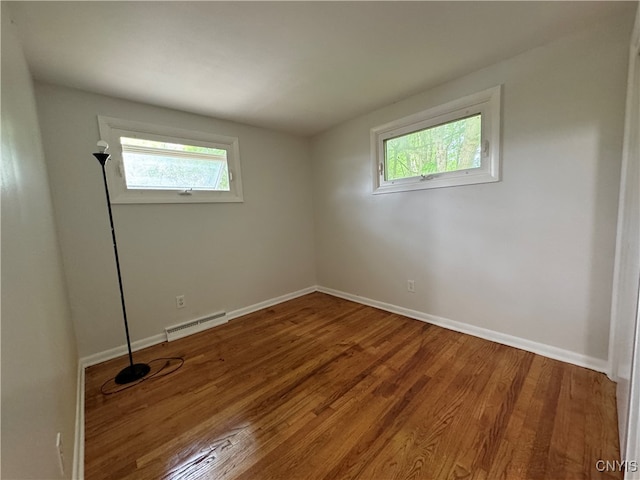 1016 Northway St, Syracuse, NY 13224 - empty room with a baseboard heating unit, plenty of natural light, and baseboards