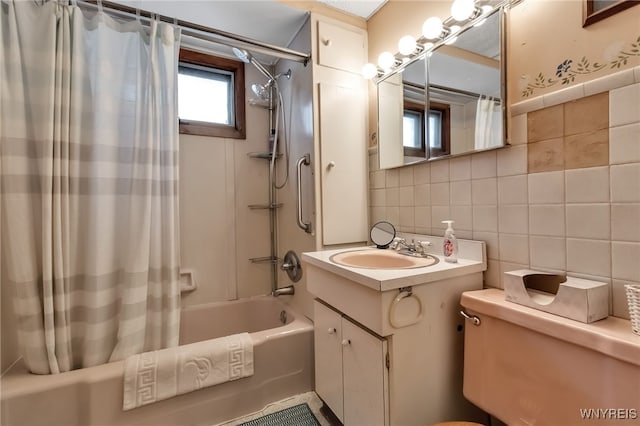 163 Shepard Ave, Tonawanda-Town, NY 14217 - full bath featuring tile walls, shower / tub combo, vanity, toilet, and tasteful backsplash