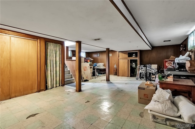 163 Shepard Ave, Tonawanda-Town, NY 14217 - finished below grade area featuring wooden walls, tile patterned floors, and stairway