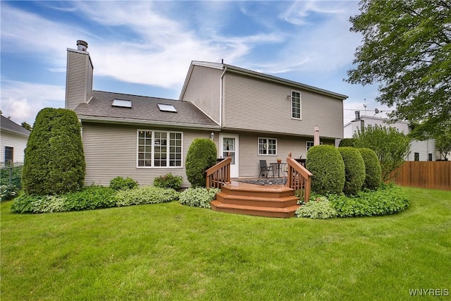 218 Palmdale Dr, Amherst, NY 14221 - back of property featuring a wooden deck and a chimney