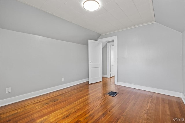 133 Avon Rd, Syracuse, NY 13206 - bonus room with lofted ceiling, hardwood / wood-style flooring, and baseboards