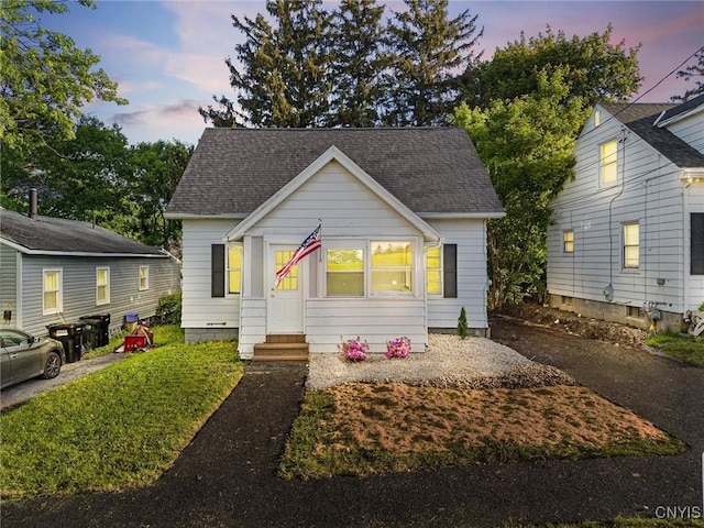 133 Avon Rd, Syracuse, NY 13206 - view of front of home with entry steps and roof with shingles