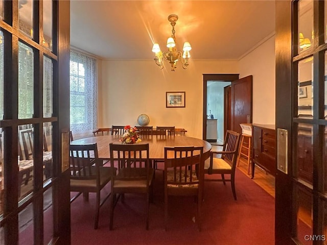 169 Pleasant St, Utica, NY 13501 - dining room featuring a chandelier and ornamental molding