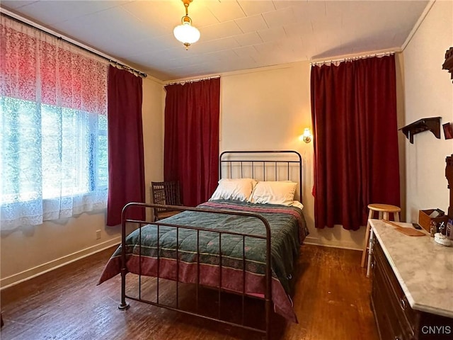 169 Pleasant St, Utica, NY 13501 - bedroom with wood finished floors and baseboards