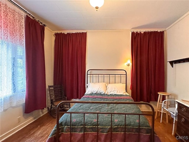169 Pleasant St, Utica, NY 13501 - bedroom with wood finished floors and baseboards
