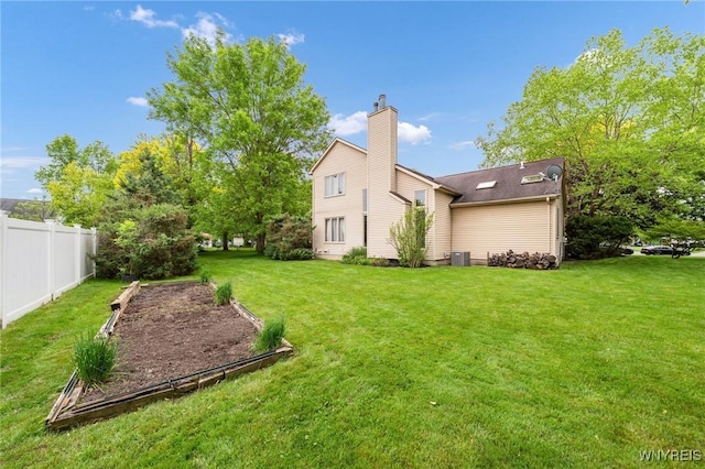 6157 Walnut Creek Ct, Clarence, NY 14051 - view of yard featuring a garden and central AC unit