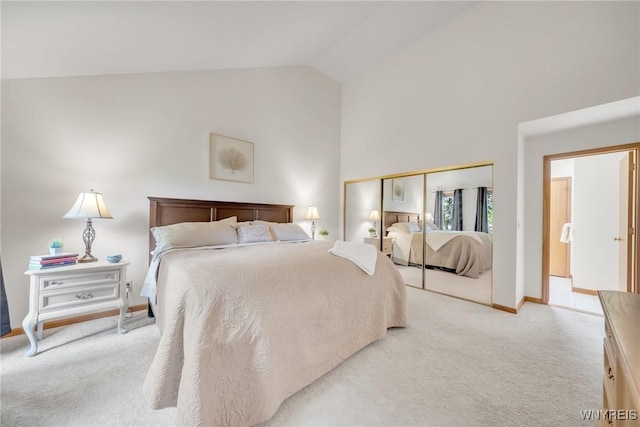 6157 Walnut Creek Ct, Clarence, NY 14051 - bedroom featuring light carpet, baseboards, a closet, and high vaulted ceiling