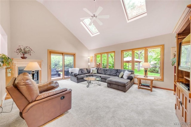 6157 Walnut Creek Ct, Clarence, NY 14051 - living room with high vaulted ceiling, a skylight, light carpet, and healthy amount of natural light