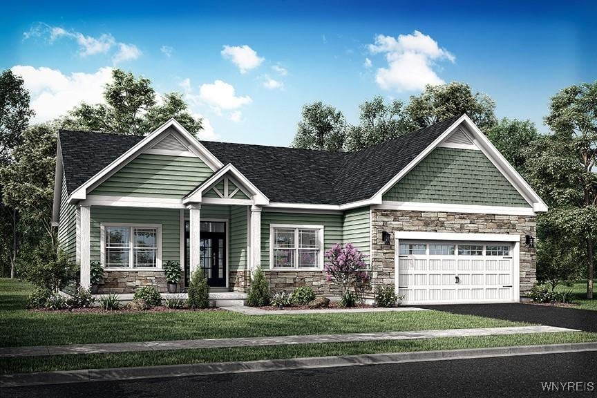 315 Bellingham Dr, Amherst, NY 14221 - craftsman-style house featuring stone siding, an attached garage, a front lawn, and driveway