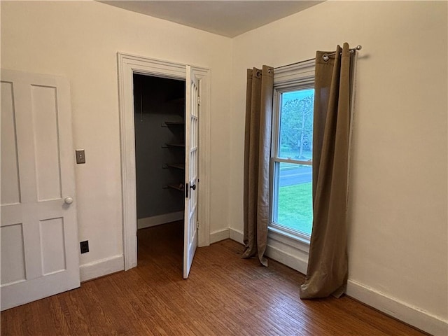 6940 County Highway 18, Plainfield, NY 13491 - unfurnished bedroom with wood finished floors, baseboards, and a spacious closet