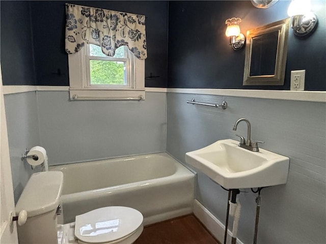6940 County Highway 18, Plainfield, NY 13491 - bathroom with toilet, a bathtub, and a sink