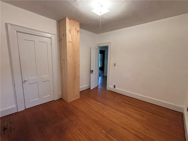 6940 County Highway 18, Plainfield, NY 13491 - unfurnished bedroom featuring wood finished floors and baseboards