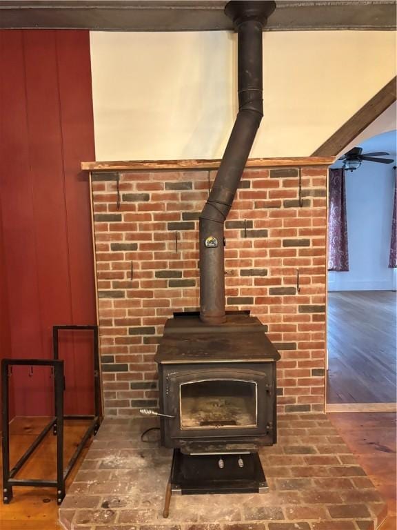 6940 County Highway 18, Plainfield, NY 13491 - detailed view of a wood stove and wood finished floors