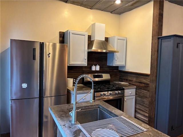 6940 County Highway 18, Plainfield, NY 13491 - kitchen with stainless steel appliances, wall chimney exhaust hood, white cabinets, and dark stone counters
