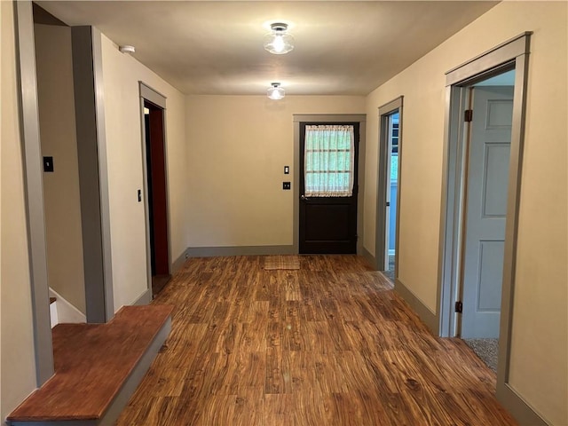 6940 County Highway 18, Plainfield, NY 13491 - hallway with dark wood-style flooring and baseboards