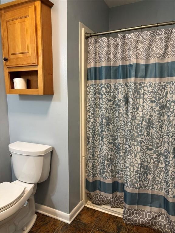 6940 County Highway 18, Plainfield, NY 13491 - bathroom featuring baseboards, toilet, and a shower with curtain