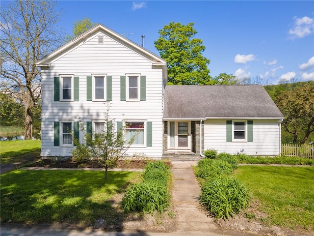 6940 County Highway 18, Plainfield, NY 13491 - view of front of house with a front lawn and roof with shingles