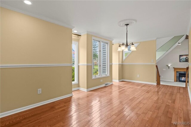 60 Gaylord Ct, Elma, NY 14059 - unfurnished dining area with ornamental molding, hardwood / wood-style floors, baseboards, a chandelier, and recessed lighting