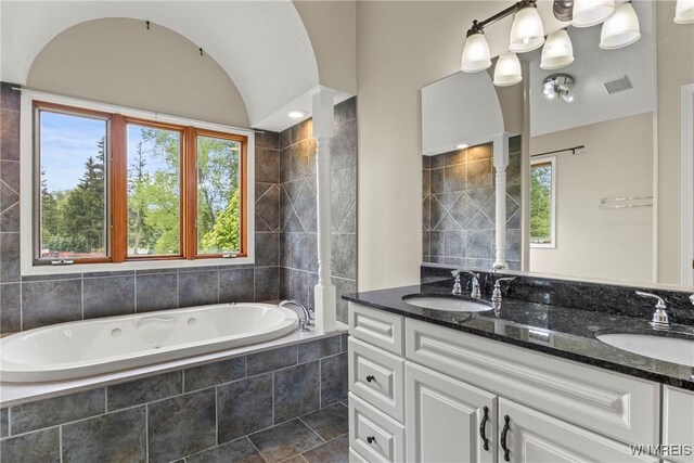 60 Gaylord Ct, Elma, NY 14059 - bathroom featuring a garden tub and double vanity