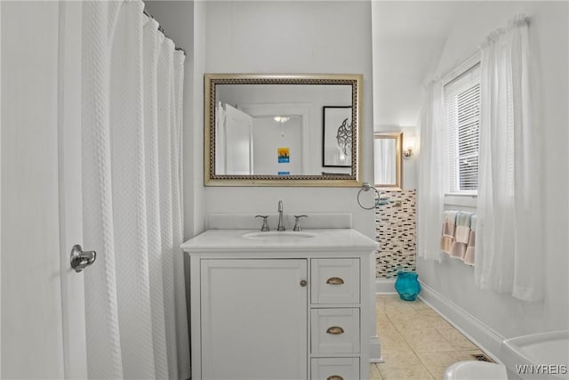 1822 Grover Rd, Aurora, NY 14052 - bathroom with vanity, tile patterned flooring, and baseboards