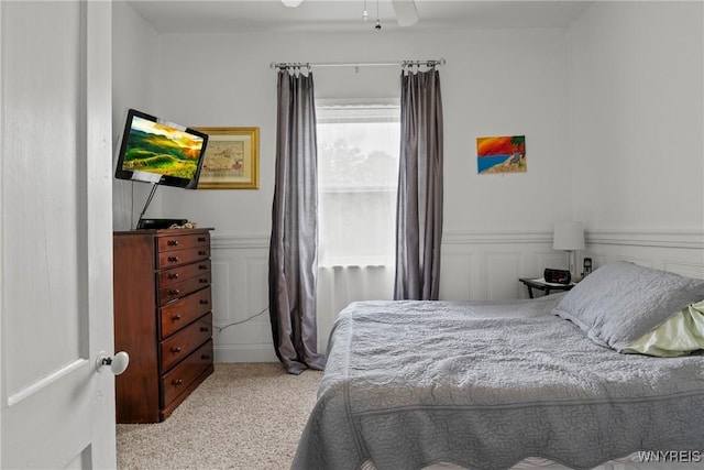 1822 Grover Rd, Aurora, NY 14052 - bedroom featuring carpet, wainscoting, and a decorative wall