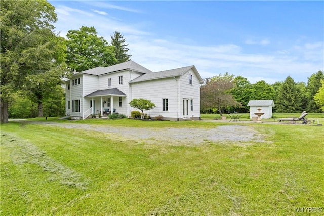 1822 Grover Rd, Aurora, NY 14052 - rear view of property with a yard and an outdoor structure