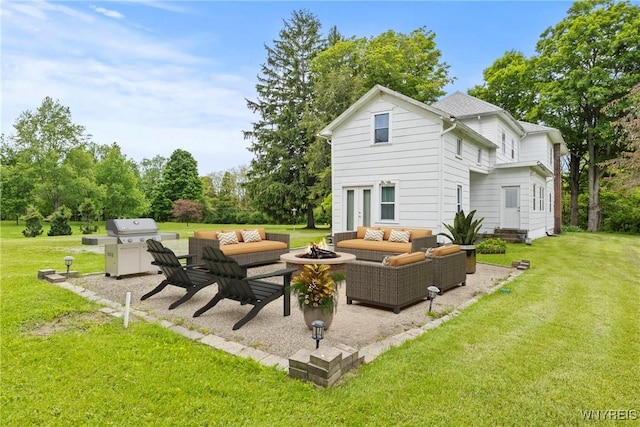 1822 Grover Rd, Aurora, NY 14052 - view of patio / terrace with an outdoor living space with a fire pit