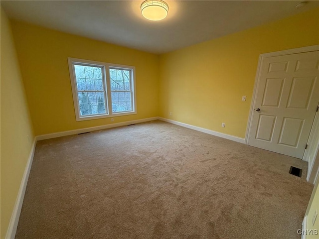 10 Platten Dr, Elbridge, NY 13080 - spare room featuring baseboards and carpet flooring