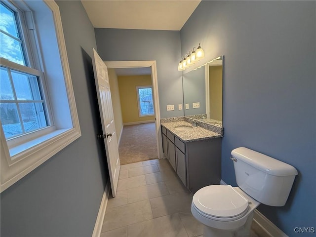 10 Platten Dr, Elbridge, NY 13080 - bathroom with vanity, baseboards, toilet, and tile patterned floors