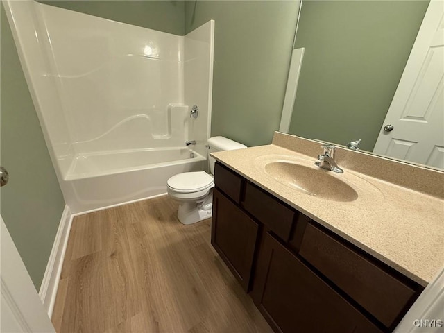 10 Platten Dr, Elbridge, NY 13080 - bathroom with wood finished floors, vanity, toilet, and shower / washtub combination
