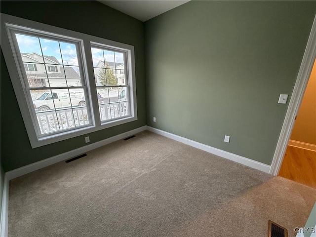 10 Platten Dr, Elbridge, NY 13080 - carpeted empty room featuring healthy amount of natural light and baseboards