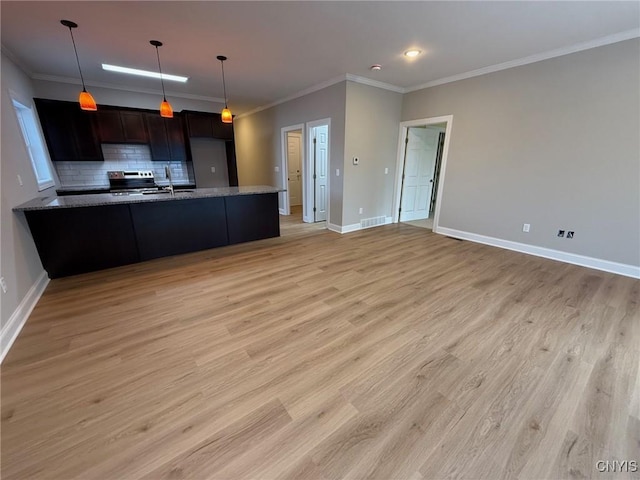 10 Platten Dr, Elbridge, NY 13080 - kitchen with stainless steel range with electric stovetop, ornamental molding, light wood-style flooring, backsplash, and light stone countertops