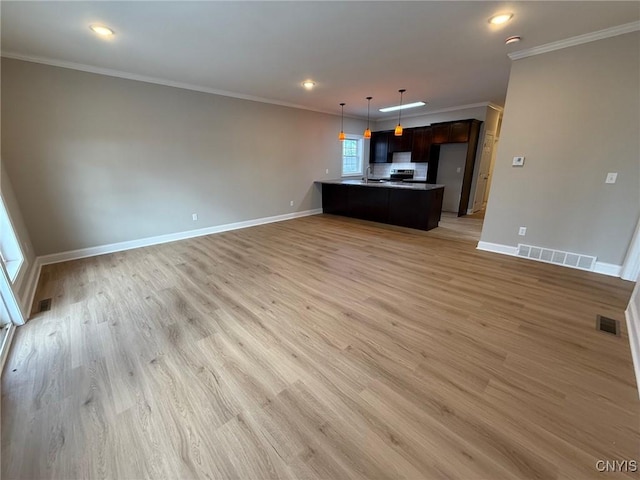 10 Platten Dr, Elbridge, NY 13080 - unfurnished living room with baseboards, crown molding, light wood-style flooring, and recessed lighting