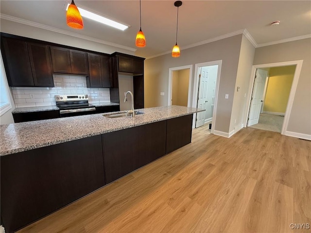 10 Platten Dr, Elbridge, NY 13080 - kitchen featuring stainless steel electric range, a sink, crown molding, light stone countertops, and tasteful backsplash