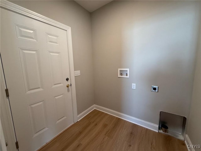 10 Platten Dr, Elbridge, NY 13080 - laundry area with hookup for a washing machine, baseboards, hookup for an electric dryer, and light wood-style floors
