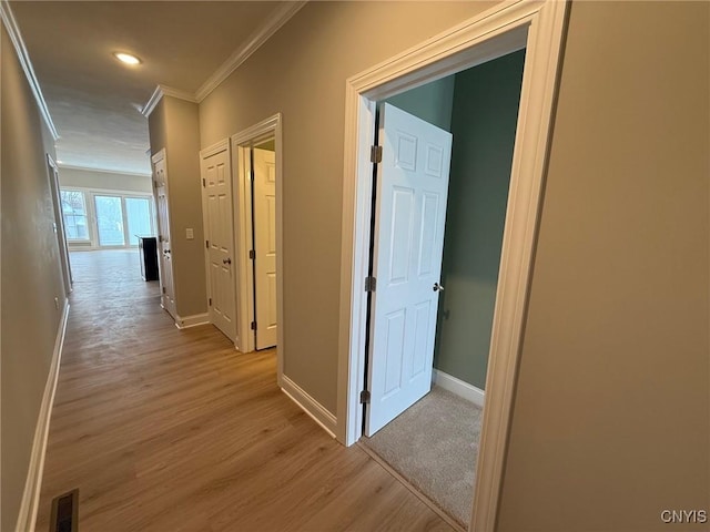 10 Platten Dr, Elbridge, NY 13080 - hallway featuring ornamental molding, light wood finished floors, baseboards, and recessed lighting