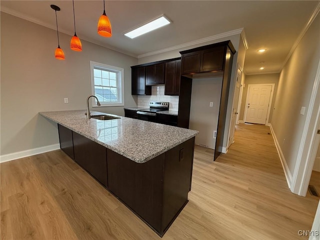 10 Platten Dr, Elbridge, NY 13080 - kitchen with stainless steel range with electric stovetop, a sink, a peninsula, crown molding, and light wood-style floors