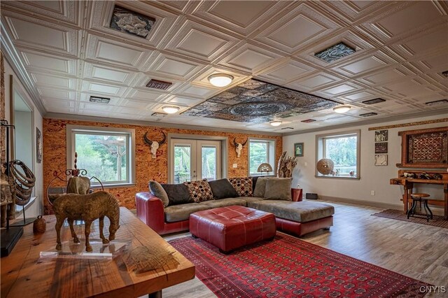 161 Portaferry Lake Dr, Pitcairn, NY 13648 - living area with baseboards, an ornate ceiling, light wood-style floors, and french doors