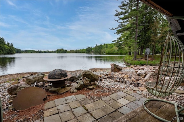 161 Portaferry Lake Dr, Pitcairn, NY 13648 - view of patio / terrace with a fire pit and a water view