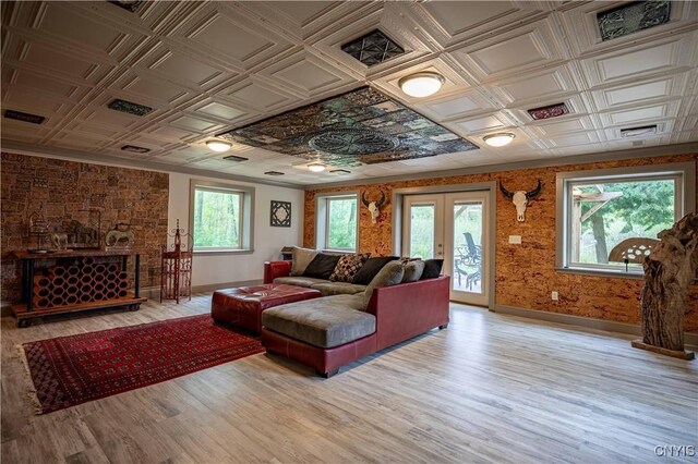 161 Portaferry Lake Dr, Pitcairn, NY 13648 - living room featuring baseboards, an ornate ceiling, light wood finished floors, and french doors